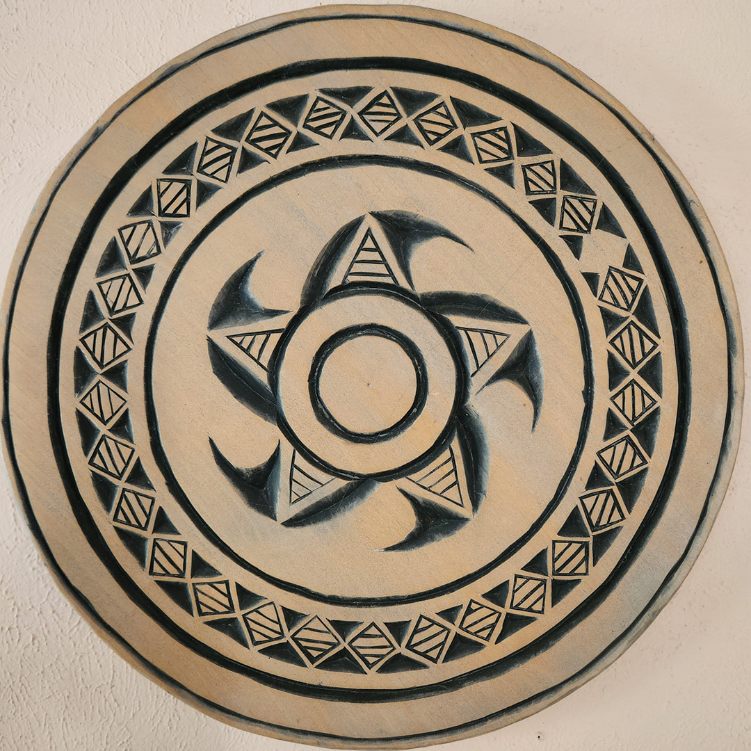 Hand carved plate: Bug Whorl